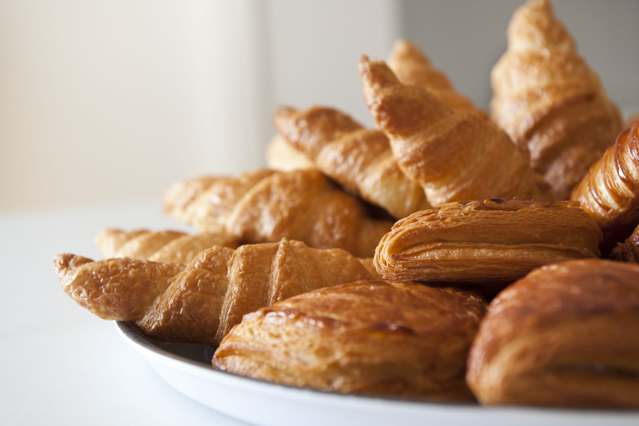 Croissants and French pastries set out together
