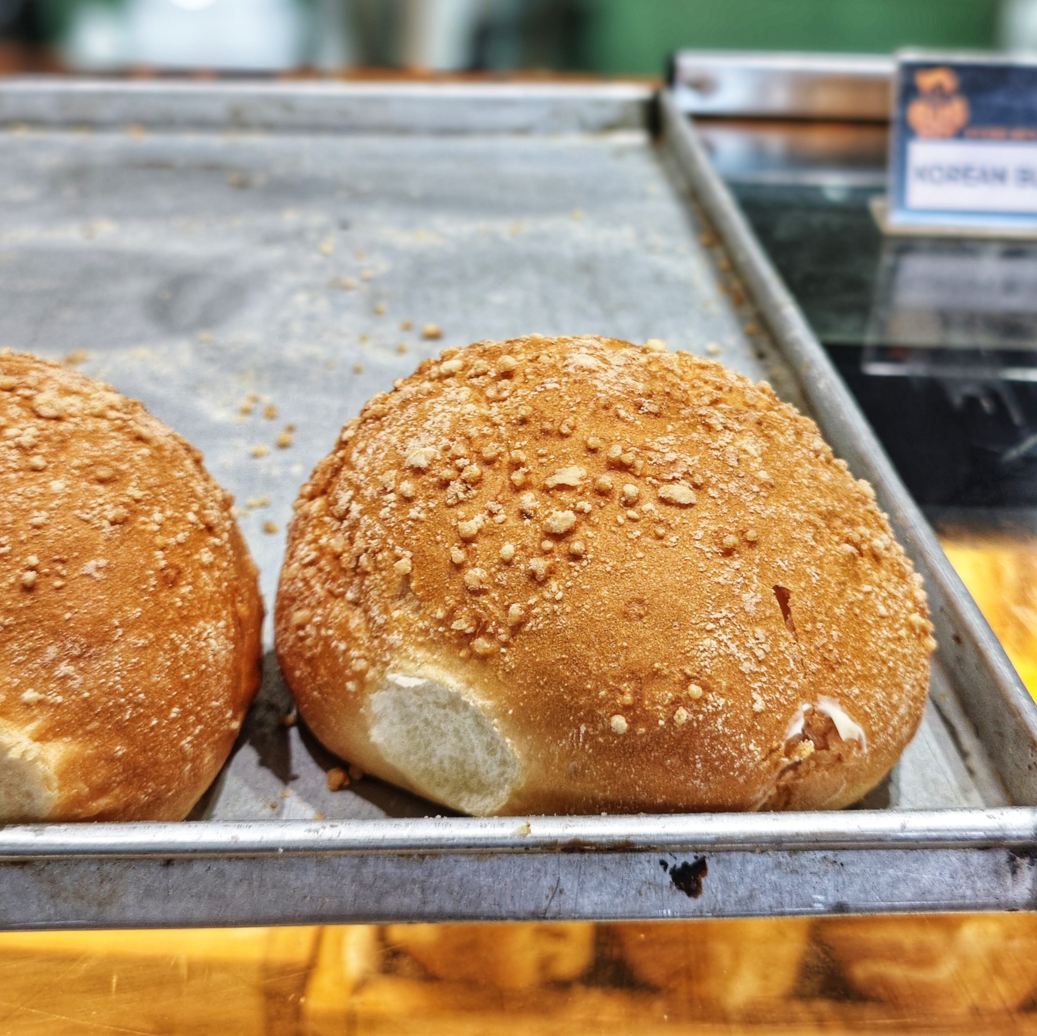 Golden bread rolls with a crumb-dusted crust